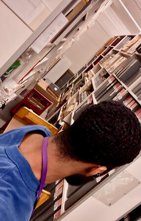 sifting through files at work, β23 sifting through files at work, β23